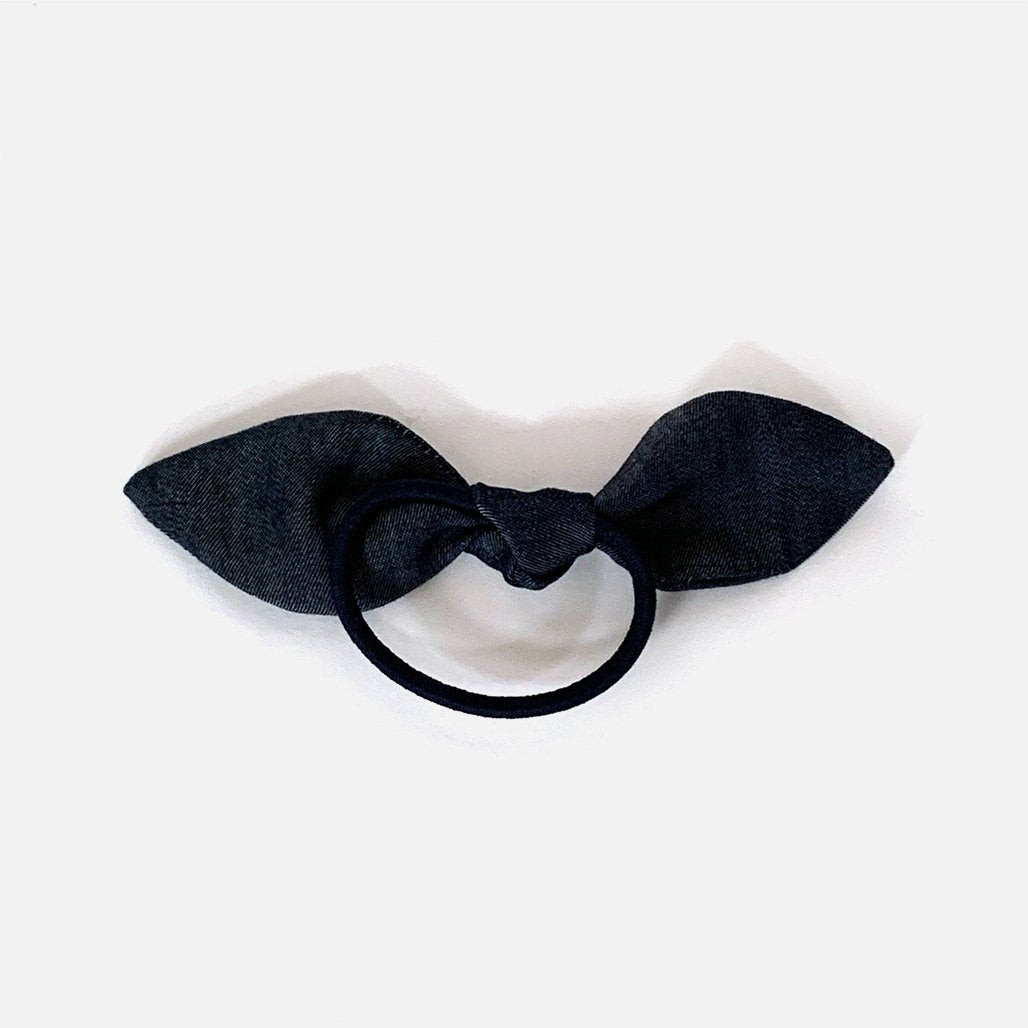 Upcycled dark indigo Denim Bow Hair Tie on black elasticated band